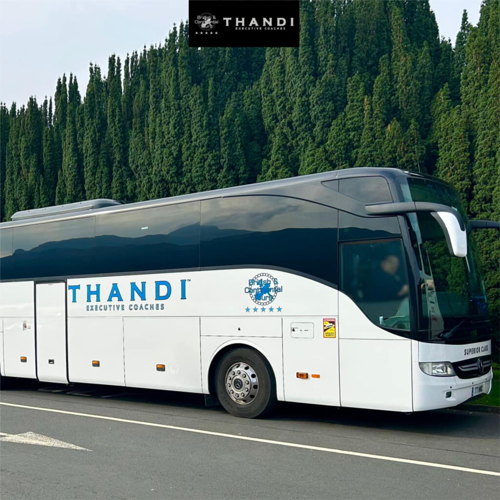Thandi Executive Coaches luxury coach hire vehicle parked roadside for corporate travel