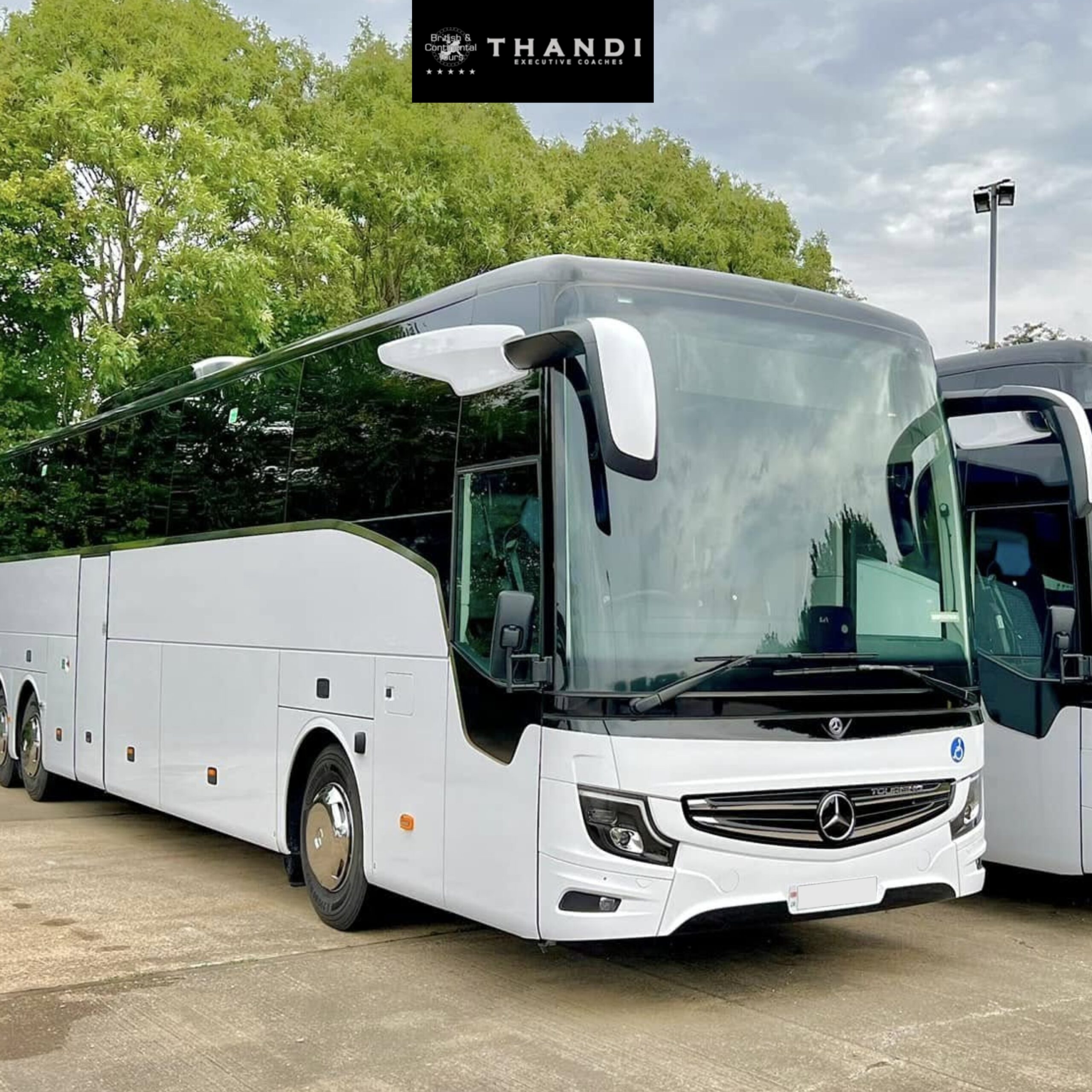 White Mercedes-Benz executive coach by THANDI, sleek design, luxury travel.